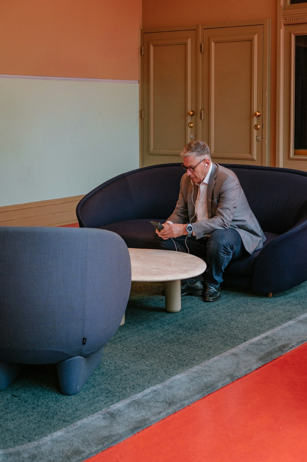 person meditating in quiet room